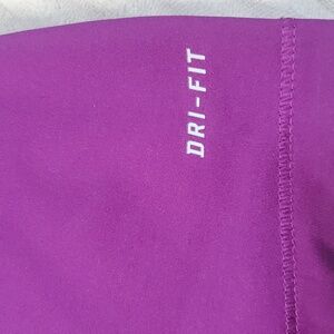 Used Nike Purple Fitted Short Sleeve Tee. Very Good Condition.